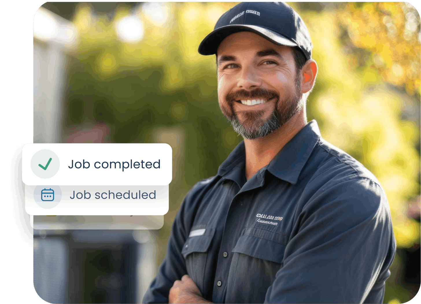 Male worker wearing hat and smiling